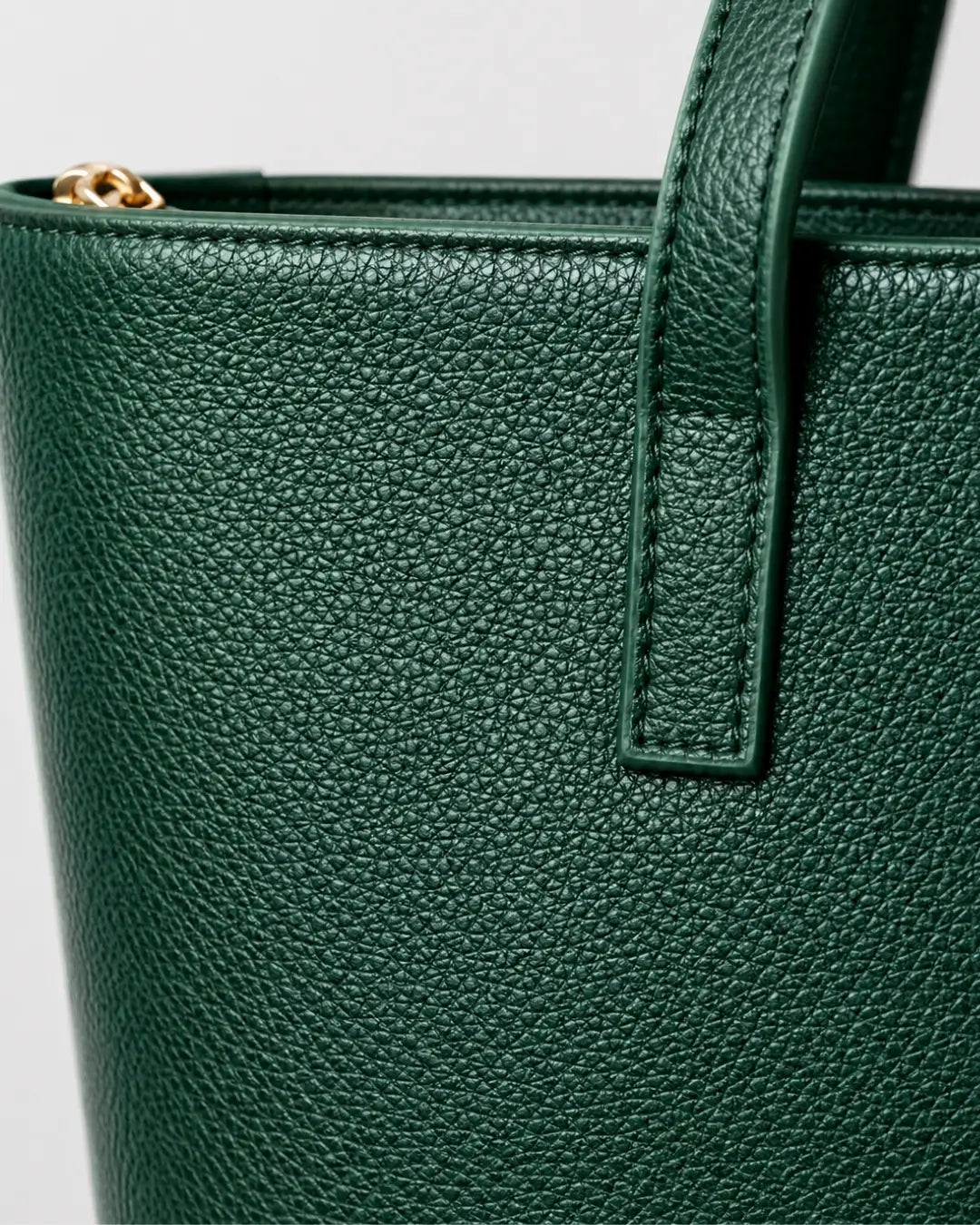 Close-up of a green full-grain leather handbag by Glacier leather